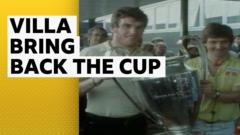 Aston Villa arrive home with European Cup