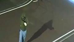 Gunman caught on CCTV opening fire on house