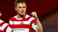 Doncaster defender McGrath signs new deal