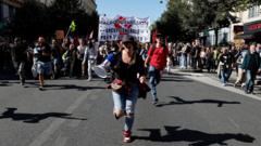 Workers across France strike over budget cut plans