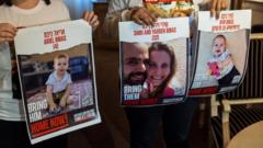 Father of youngest hostage among three men to be released on Saturday, Hamas says