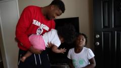 Oshay's brother and niece playing