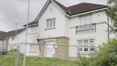 Police investigate car crash into house in Glasgow suburb