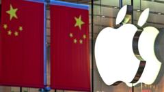 Apple logo on the front of a store in front of a nearby Chinese flag