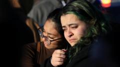 People react after a mass shooting at the Club Q gay nightclub in Colorado Springs, Colorado, U.S., November 20, 2022