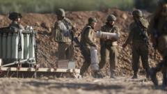 Israel has amassed artillery at the border with Gaza raising fears of a ground offensive