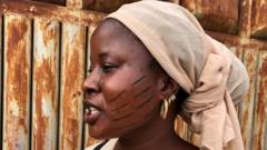 A woman with scars on her face