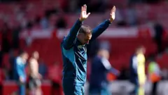 Vitor Pereira, Manager of Nottingham Forest, acknowledges the fans