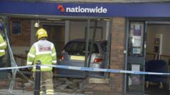 Car crashes through wall into town's bank branch