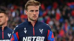 Why has Palace defender Holding been frozen out?