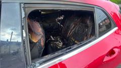 Car burnt out in 'racially-motivated' attack