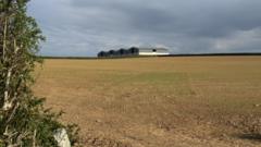 Wind turbine plans face opposition from village