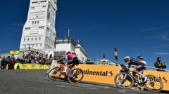 Ben Healy leading Valentin Paret-Peintre on the final bend of stage 16 of the 2025 Tour de France
