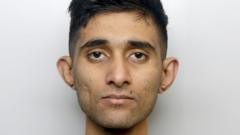 Man who murdered wife pushing baby jailed for life