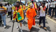 Sri Lankan retired soldiers held national flags and placards protesting on April 9, 2022, at Galle Face, Colombo.