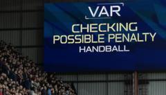 Why are handball calls causing confusion in Premiership?