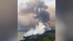 Aerial footage shows massive smoke plumes from Canadian wildfires