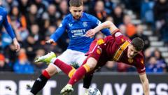 Scottish Premiership: Tavernier penalty brings Rangers level, Hibs take lead