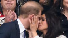 Harry and Meghan cheer from stands at Invictus Games in Canada