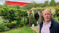 Neighbours want 'red monstrosity' toned down