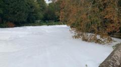 Thick foam on river prompts investigation