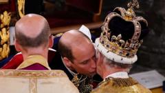 The Prince of Wales kisses his father King Charles III during his coronation ceremony in Westminster Abbey
