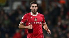 Wrexham's James to battle through pain barrier