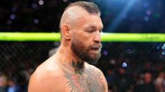 McGregor to have surgery but hopes to fight again