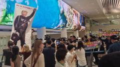 South Korean workers detained in US raid arrive home