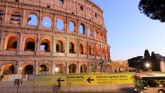 Image shows the Colosseum in Rome