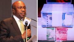 gODWIN eMEFIELE WIT PICTURE OF NEW NAIRA NOTES