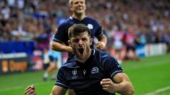 Seven-try Scotland keep World Cup hopes alive