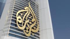 Al Jazeera office raided as Israel takes channel off air