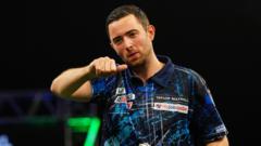 Humphries hits nine-darter in Grand Slam win