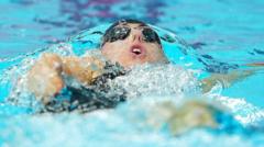 Island swimmers break record twice on final day