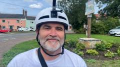 Wheelchair user 'devastated' to pause coastal challenge