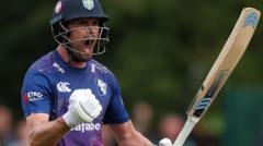 Durham all-rounder Rhodes extends deal