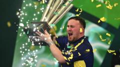 Watch: Littler’s night of glory as he is crowned darts champion