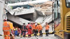 'No signs of life' for dozens missing in Indonesia school collapse