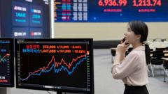 Oil prices drop and stock markets rise after reports of deal to end Iran war