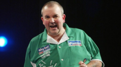 Phil Taylor helps raise £10k for special school