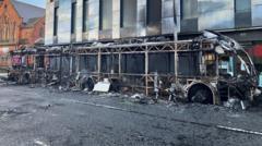 Violence condemned as clean-up operation under way after Belfast disorder