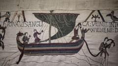 A detail of the Bayeux Tapestry showing a boat with people arriving onto shore