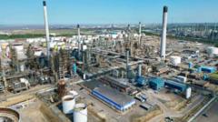 Oil refinery workers rally outside Parliament