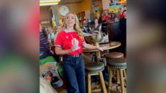 Katherine Jenkins sings national anthem in bar