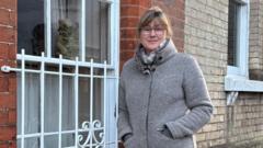 Woman to fight council window ruling after 'drunk man falls into lounge'