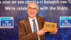 Duais Seirbheisean don Ghàidhlig do Bhoyd Robasdan aig Na Trads