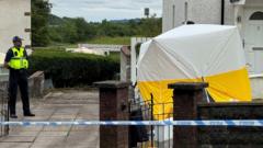 Woman dies after suspected assault as man's body found at reservoir 