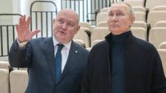 Madaxweyne Putin iyo Mikhail Razvozhayev, barasaabka Sevastopol, oo ku sugan Crimea oo Ruushku qabsaday 