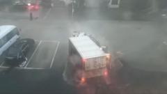 Lorry turns over as typhoon hits China